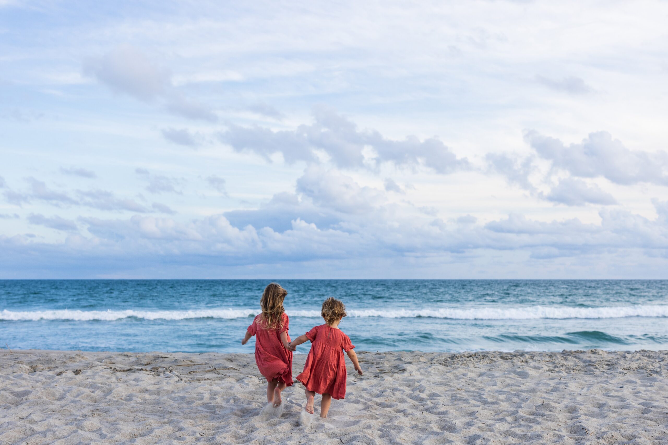 Girls playing on Emerald Isle beach